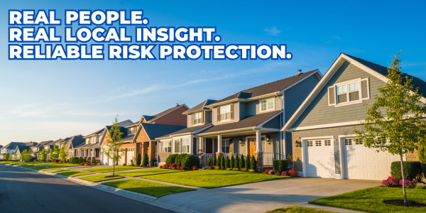 A row of suburban houses under a clear blue sky, with text overlay: "Real people. Real local insight. Reliable risk protection."